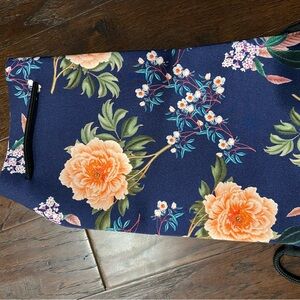 Triangl Floral Print pull string backpack